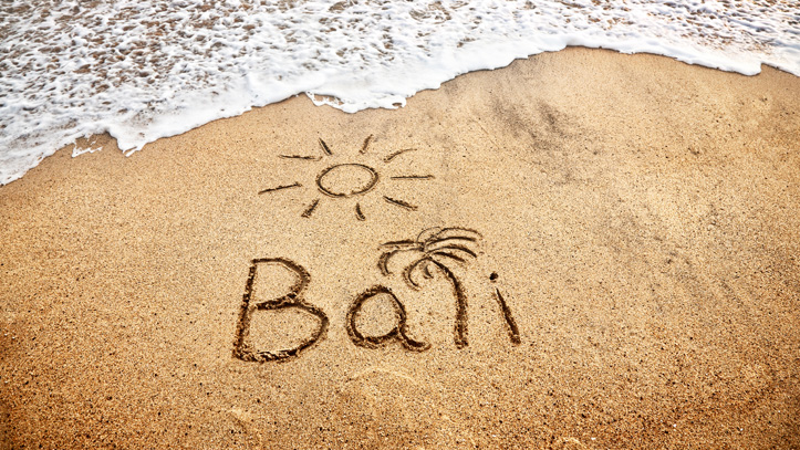 Bali écriture sable mer